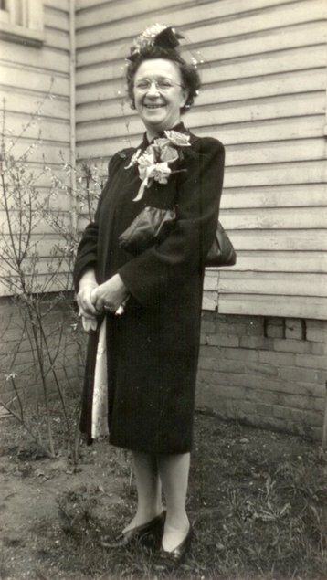 mom at corner of house